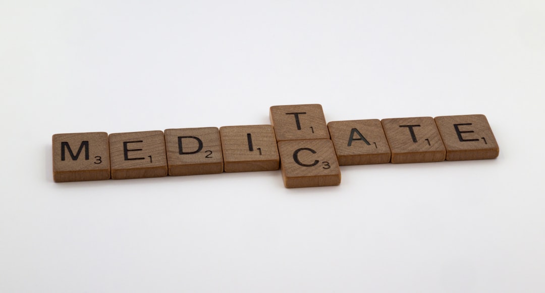 Does Medicare Cover Dental Implants? Coverage Rules Explained 2 a crossword spelling out the word meditate on a white background