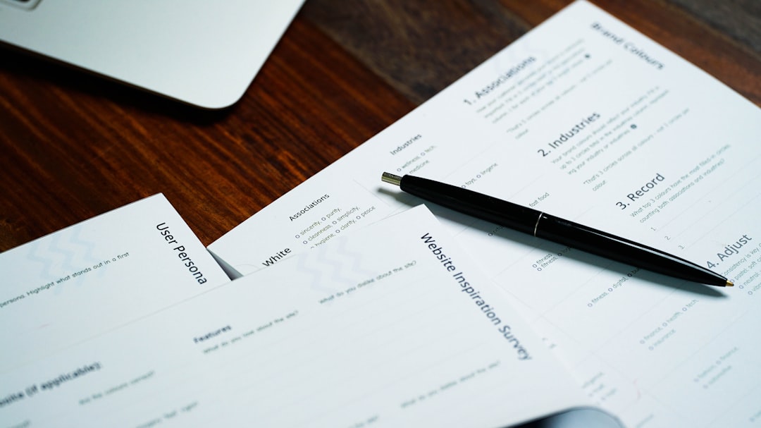 Guardian Disability Insurance Appeal 6 a pen sitting on top of a pile of papers