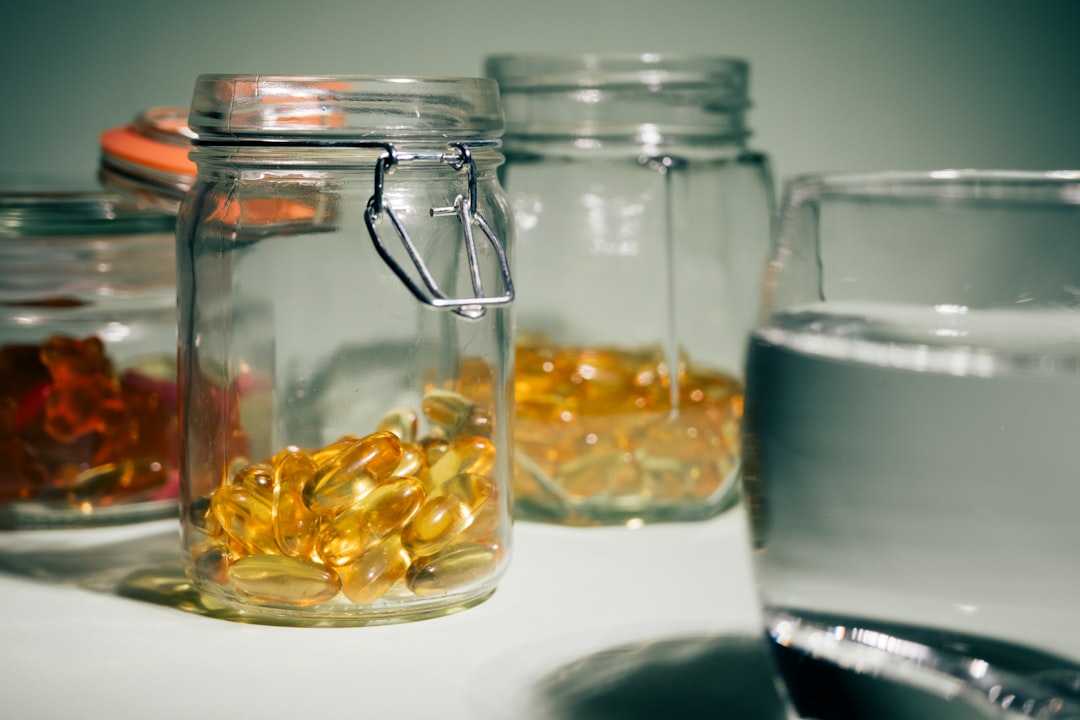 A glass filled with water and gold flakes