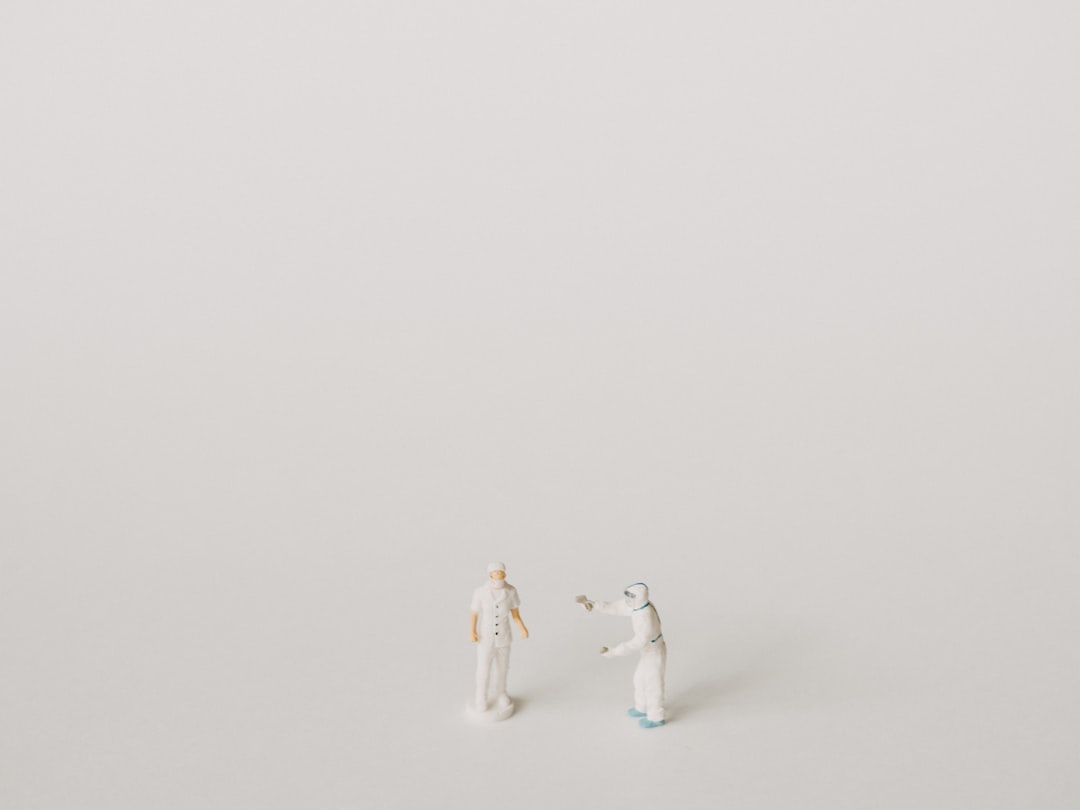 a couple of figurines standing next to each other