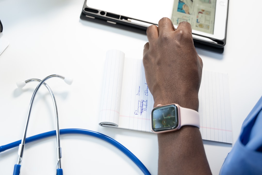 Ro Review: Costs, Treatments, Pros and Cons of the Telehealth Platform 9 a hand holding a smart watch
