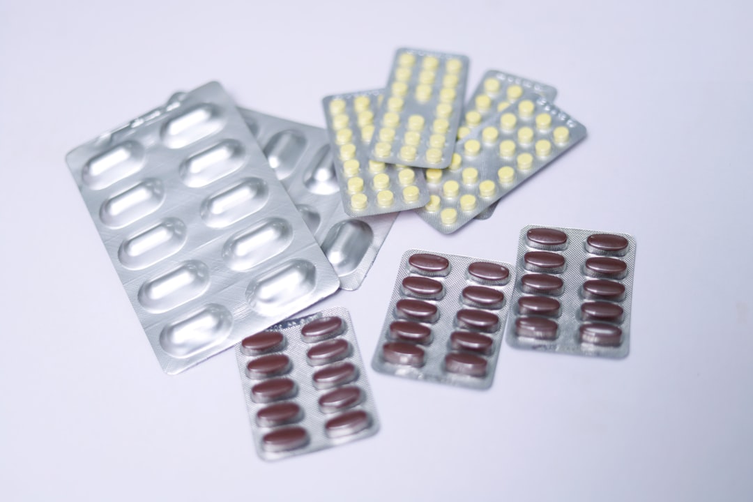 What to Avoid When Taking Low Dose Naltrexone 2 yellow and red medication pill blister pack