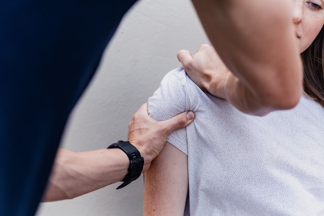 When Should You NOT Have Rotator Cuff Surgery? 5 a woman holding onto a man's arm